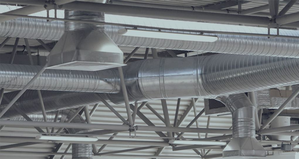 Commercial HVAC ductwork repair and installation showing professional ventilation system maintenance by APS-Hoods